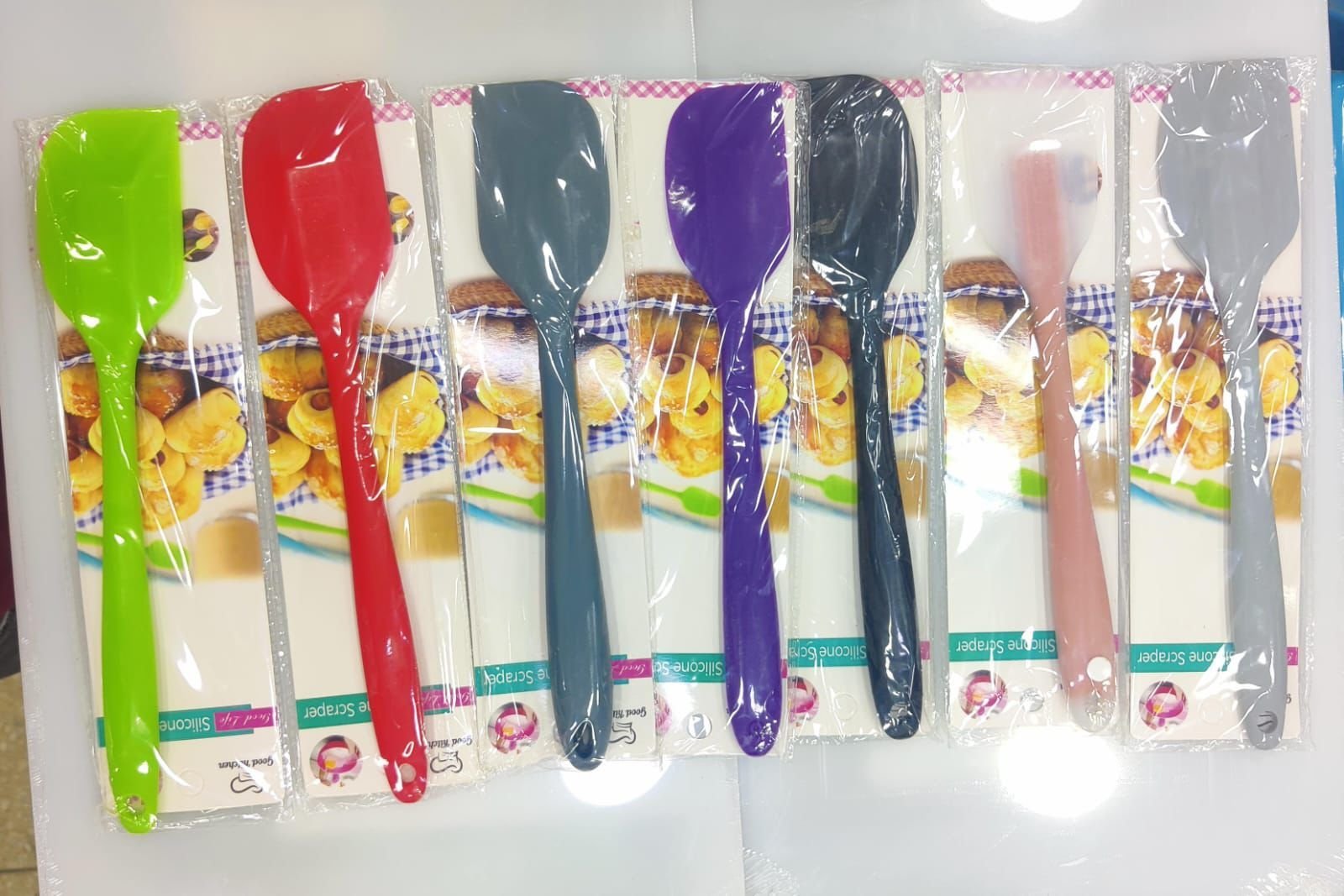 IMG-20250718-WA0256.jpg NON STICK HEAT RESISTANCE SILICONE COOKING SPOONS AND SPATULAS : - each (12 inches) - Image 1